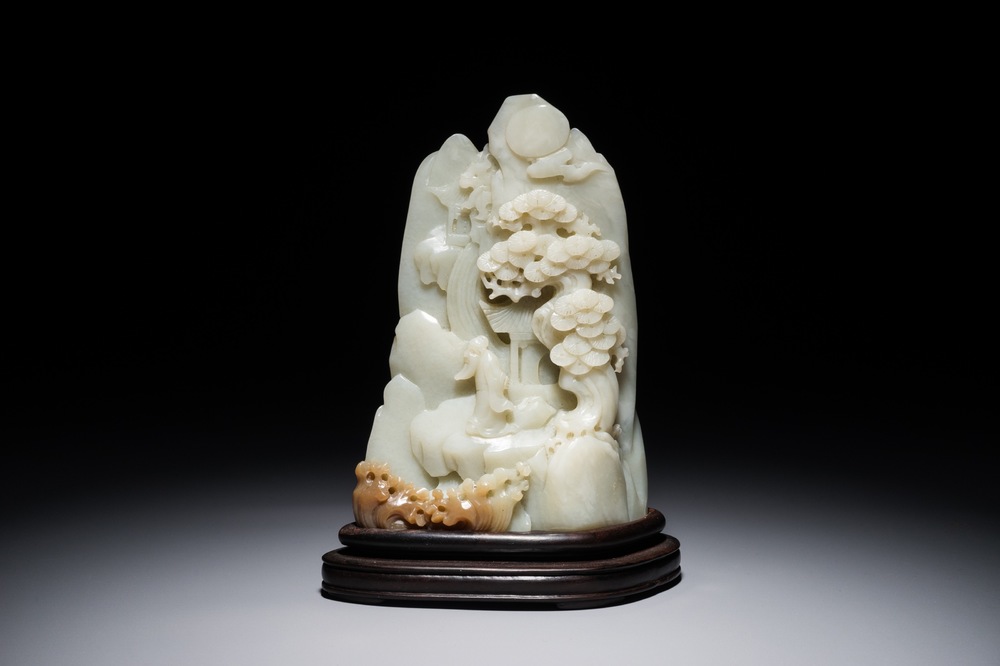 A Chinese jade carving of a mountain landscape, 20th C.